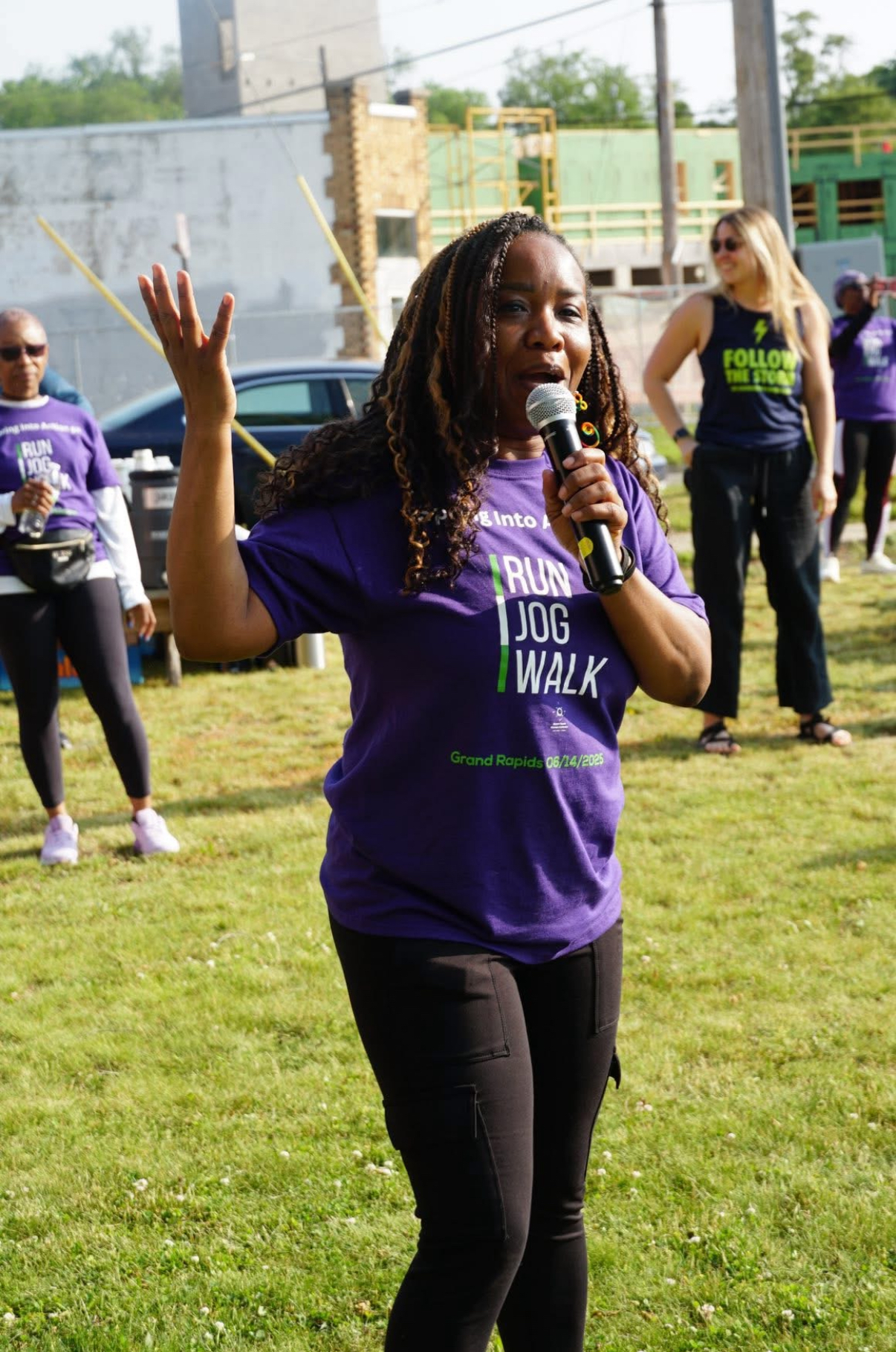 Odessa Yonkers speaking at the Spring Into Action 5K