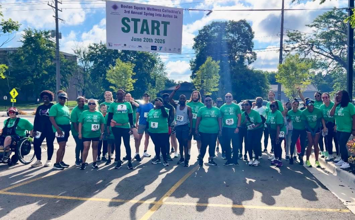 The community gathering at the starting line of the Spring Into Action 5K